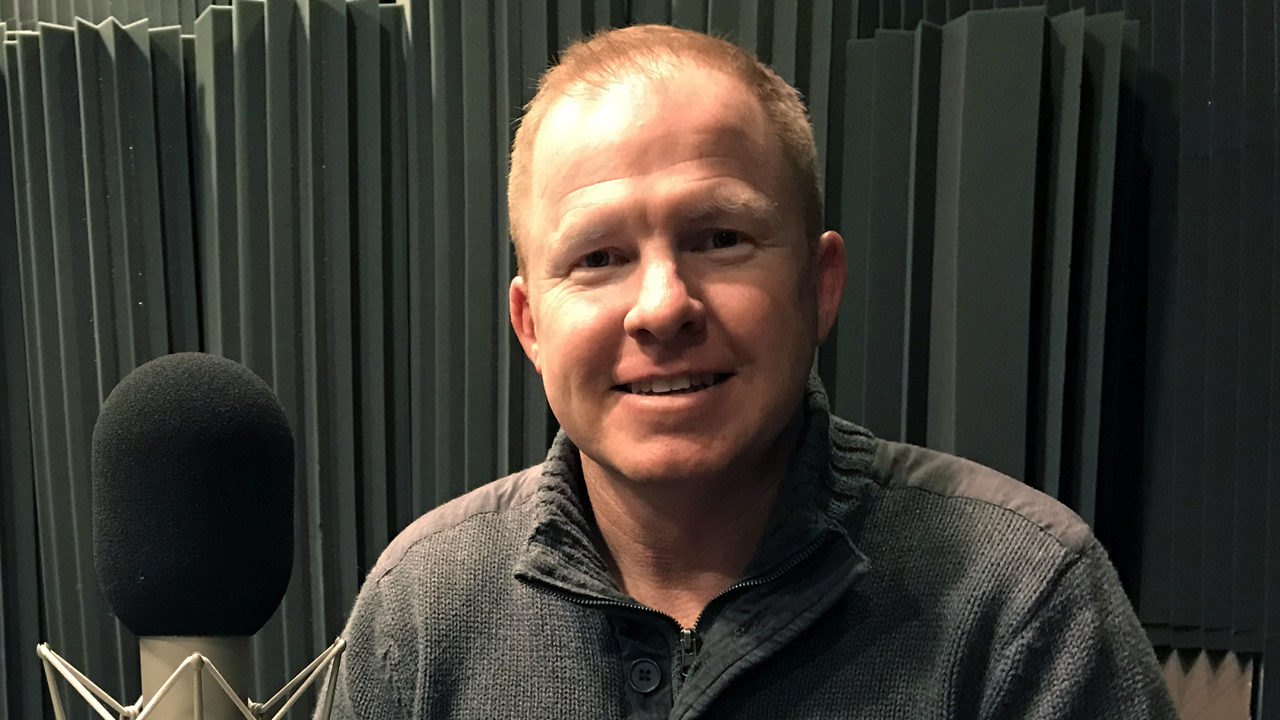 Tom in the studio smiling